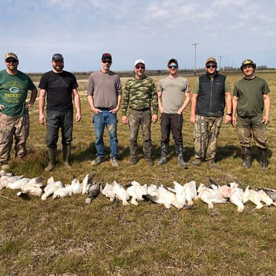 Happy clients, snow geese, epic guide service